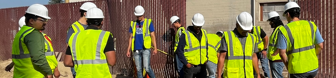Construction management students working during a lab 