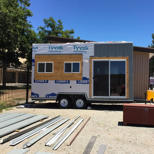 Wide view of tiny Office with sliding door