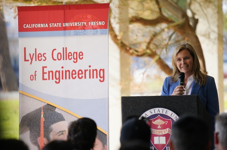 Mary Teichert speaking at a press conference