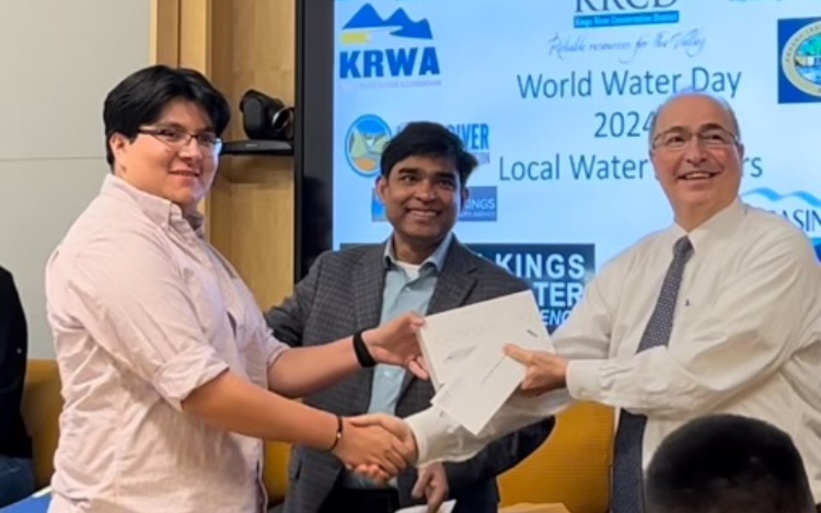 Carlos Herrera Madigral being recognized at a World Water Day event