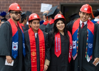 Fresno State graduates smiling