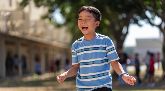 Young child laughing