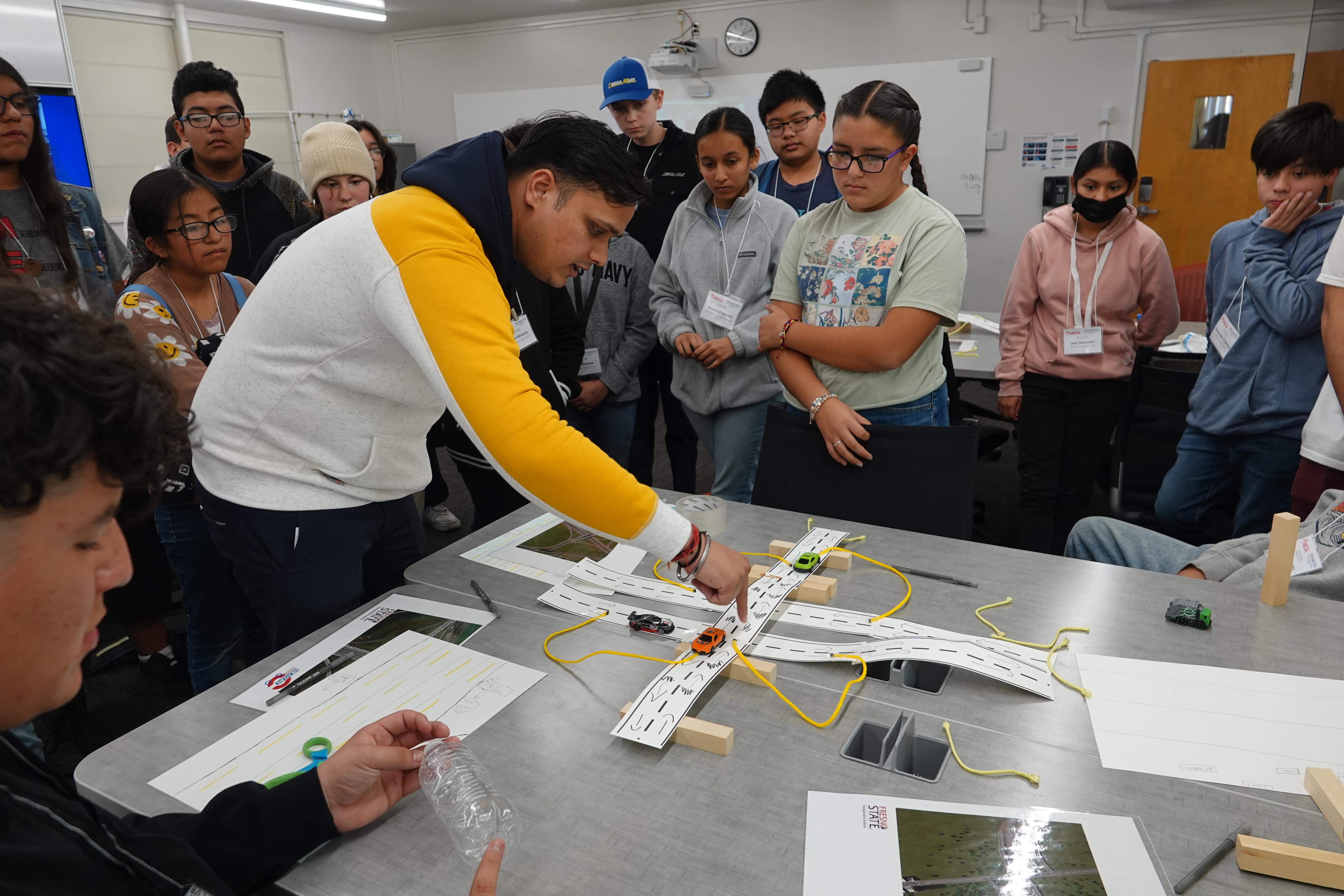 FSTI Graduate Fellow teaching highways to middle school students